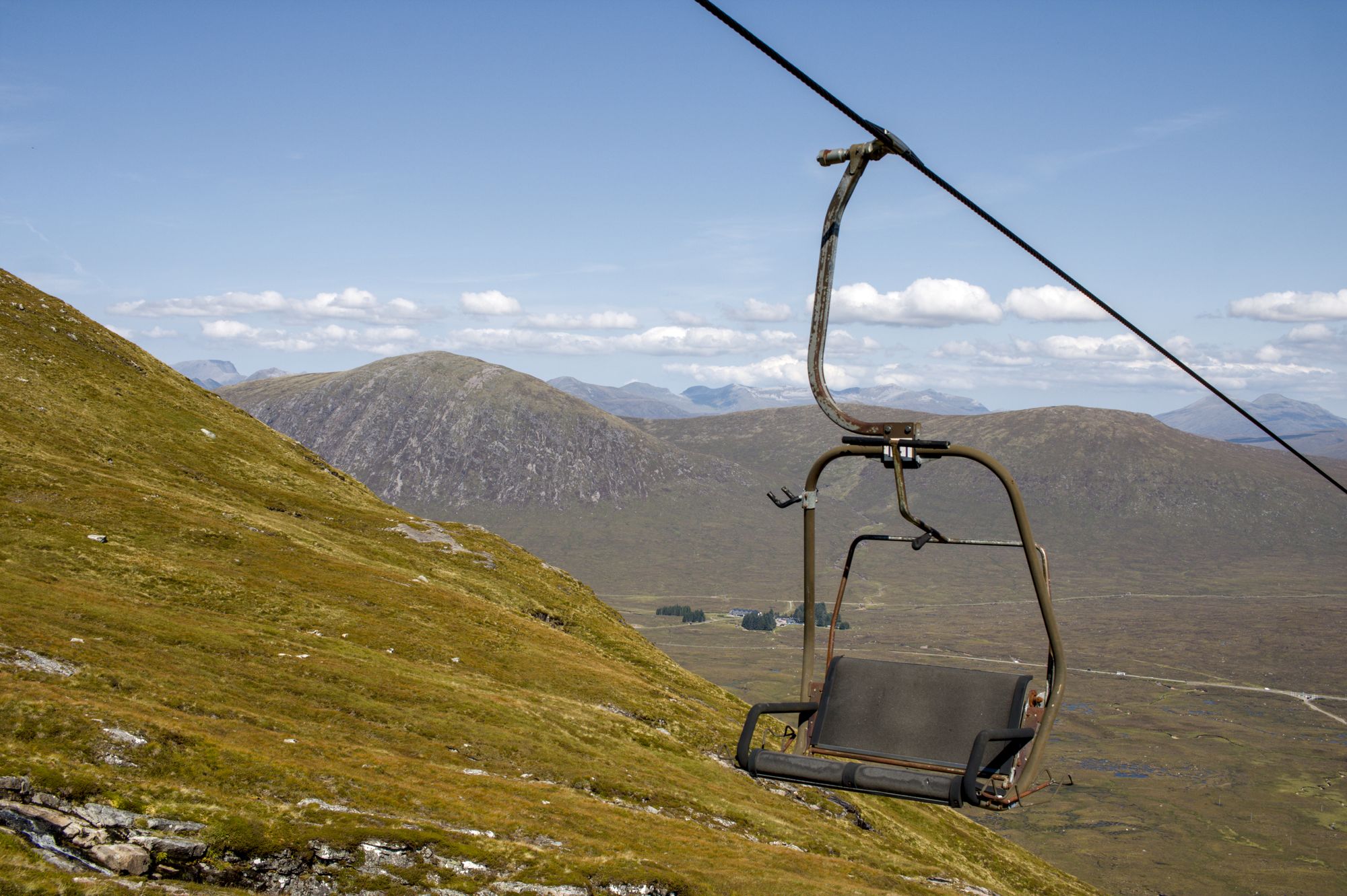Highland peaks and mountain roads along the North Coast 500 in Scotland